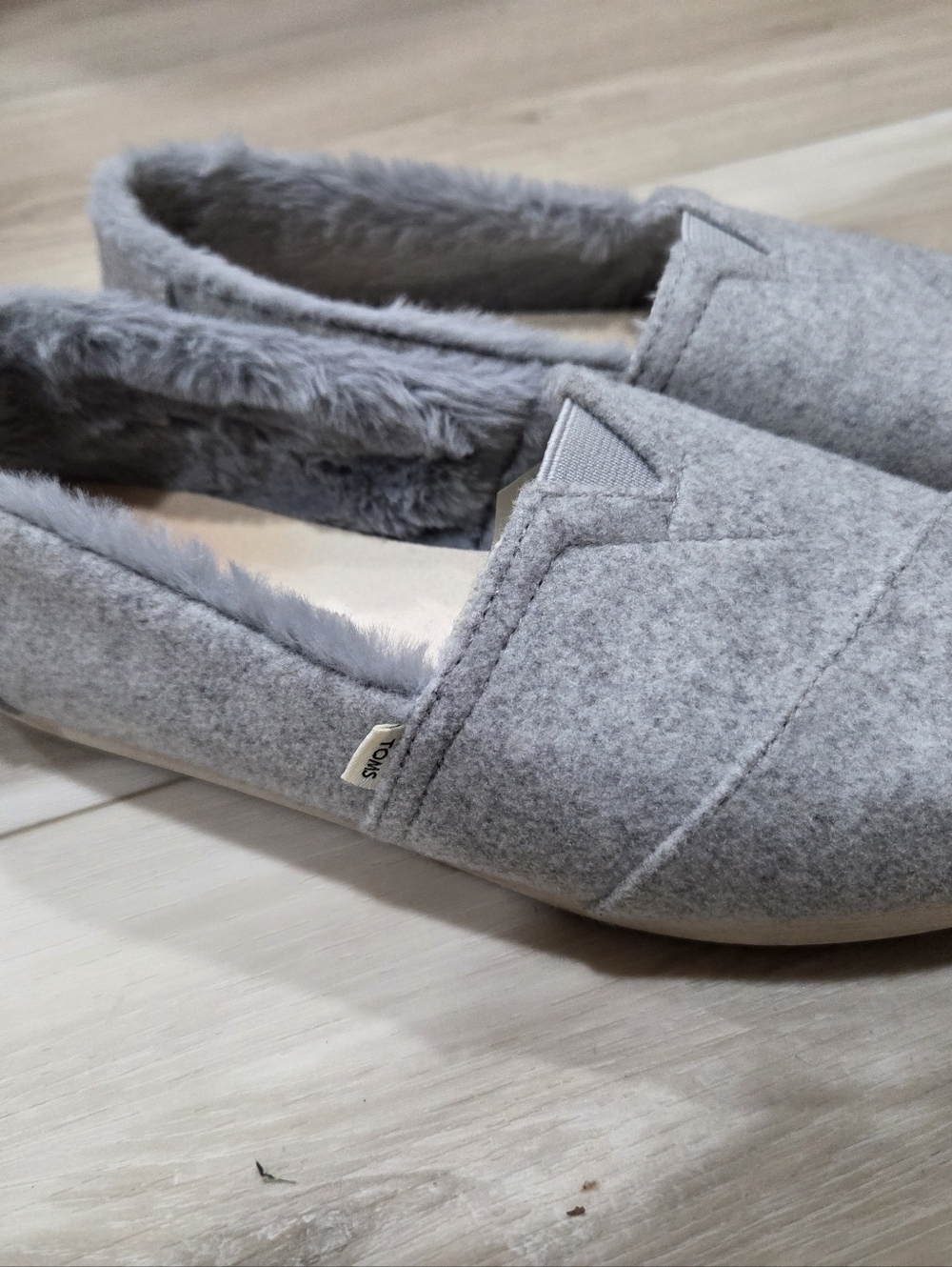 TOMS Women's Slip-On Plush Lined Slippers in Light Gray